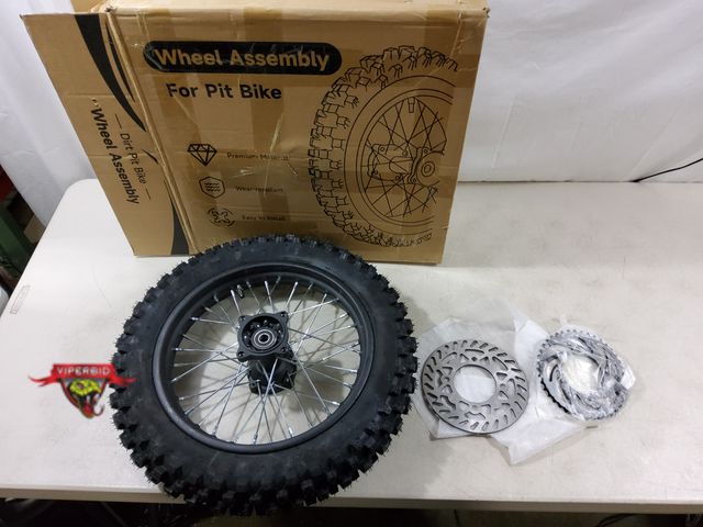 Lot 7-131101 - Dirt pit bike wheel assembly. 90/100-14 MIC