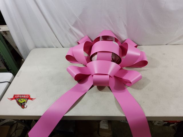 Lot 7-133643 - Large Pink Plastic Bow. (28"dia x 8"T)