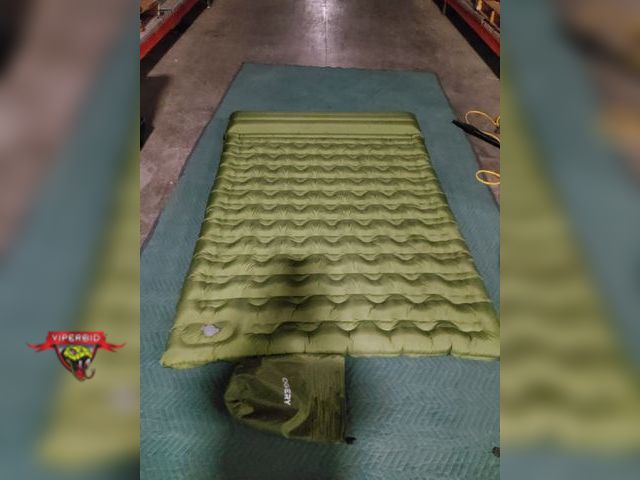 Lot 7-131106 - Ogery sleeping pad with built in foot pump. 79" x 55" x 6" after inflation.
