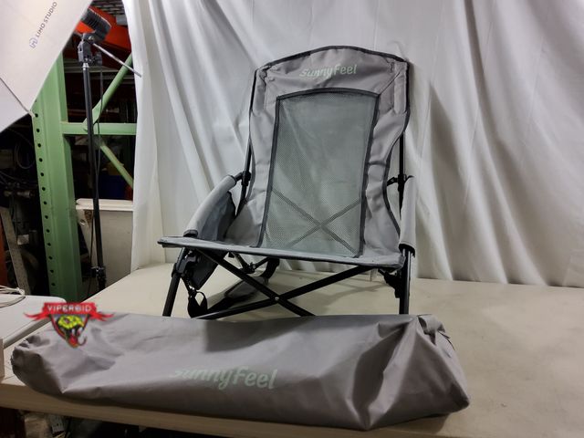 Lot 7-134850 - SunnyFeel low beach chair with mesh and side pocket. 22"D x 25"W x 23"H.