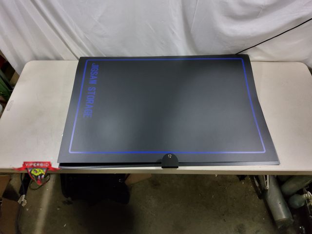 Lot 7-134483 - Puzzle Storage Folder Binder Keeper / Space-Saving Organizer. Holds 20 Puzzles. 28.35" x 40.16"