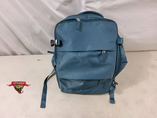 Lot 7-130611 - Multi-Pocket Backpack with usb charging port. 17"H X 12"W.