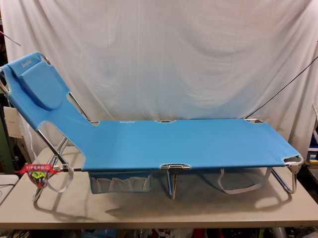 Lot 7-132962 - SunnyFeel folding lounge chair with face hole.