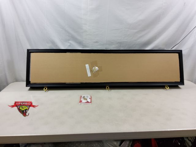Lot 7-130488 - Wall mounted, Lockable Display cabinet with keys. 55-1/2"L X 13" X 4"D.