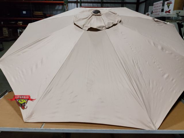 Lot 7-130761 - Missing lock pin. 9 Ft. Patio umbrella. Tilts.