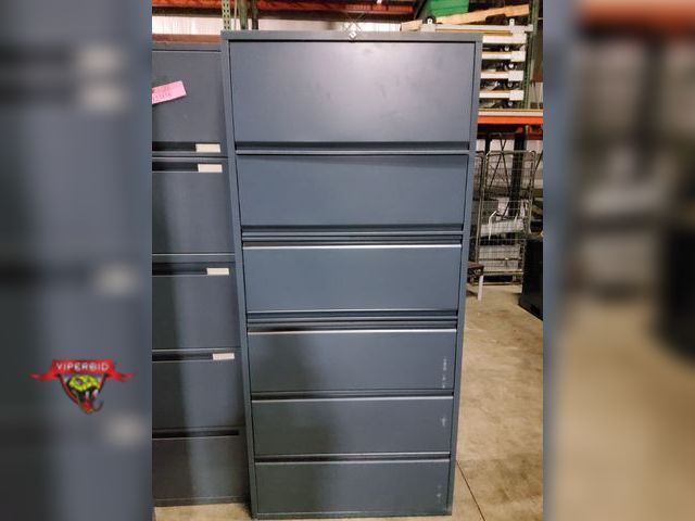 Lot 7-123817 - 6-Drawer metal file cabinet - Top 2 drawers have lift up door. Dimensions:  36"W X 18"D X 80-3/4"H. ...