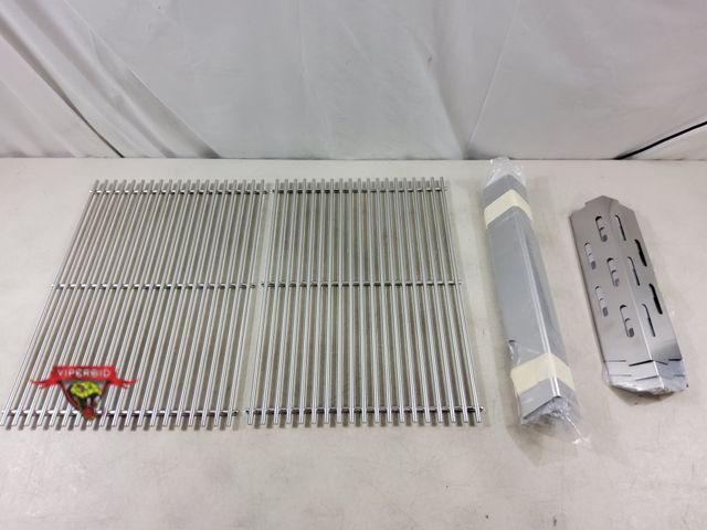 Lot 7-133836 - Grill replacement parts. Heat tents are 17" and  grill grates are 19" X 13-3/8".