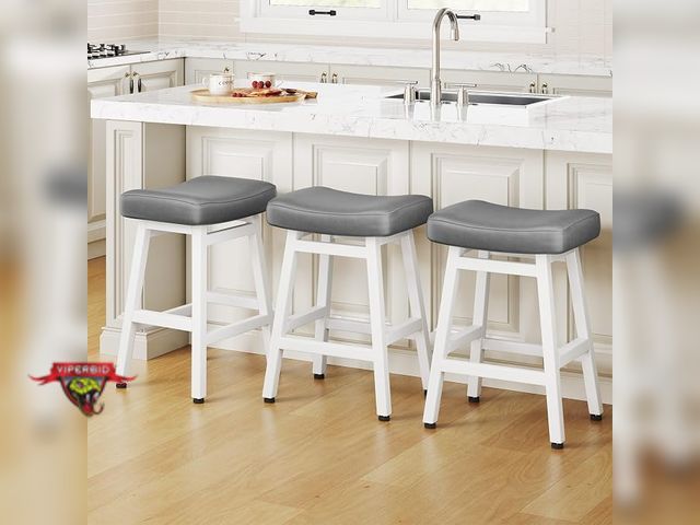Lot 7-132917 - Set of 3 - Raynesys 24" leather upholstered saddle barstools. 12.99"D x 17.52"W x 24.41"H