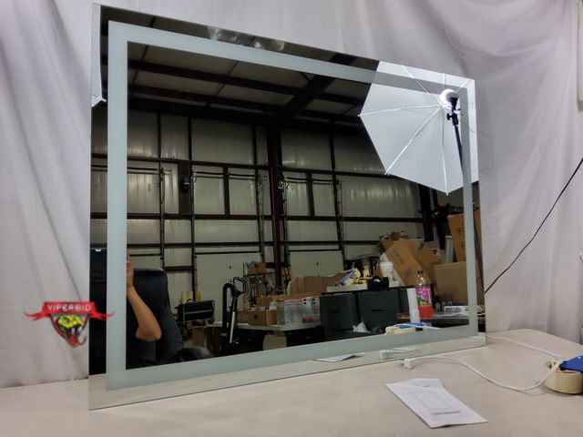 Lot 7-135031 - Small chip top corner. Yeelait led lighted plug-in bathroom mirror. 48" X 36".