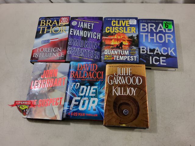 Lot 7-133540 - (7) Assorted books.