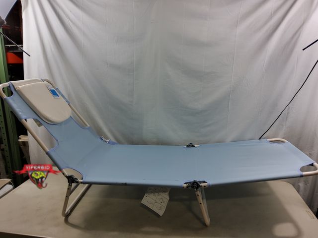 Lot 7-131874 - Multi-Position folding lounge chair with face hole. Tad dirty. 32.88in H x 21.62in W x 70.88in D