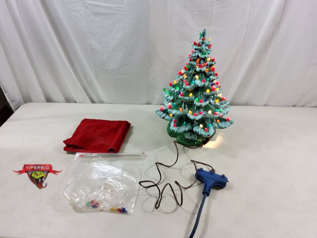 Lot 7-123729 - 19"H Ceramic Christmas tree. Works! Bulb included.