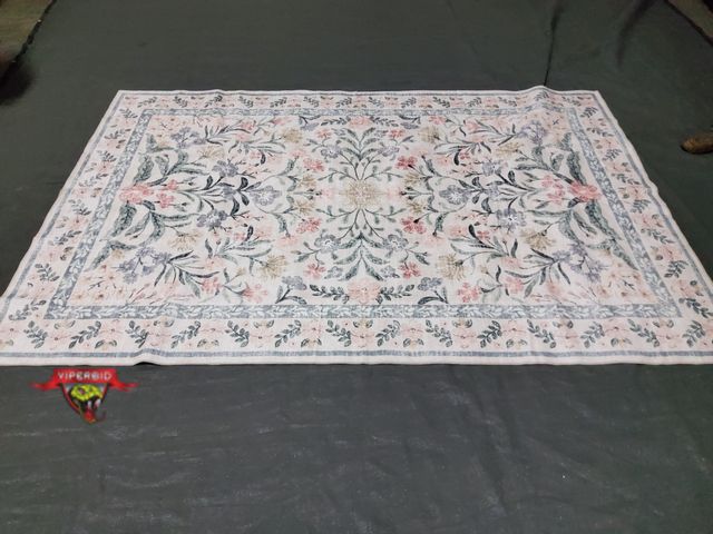 Lot 7-131694 - 6 ft. X 9 ft. Area rug.