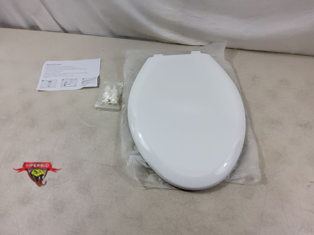 Lot 7-130222 - Plastic elongated toilet seat.