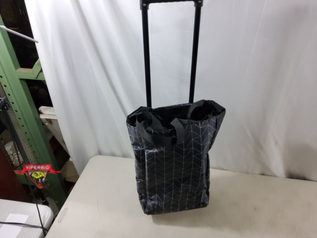 Lot 7-133738 - Folding shopping cart bag trolley. Bag is 12" X 5" X 17-1/2"H.
