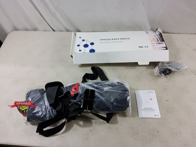 Lot 7-133635 - FocuBoody hinged knee brace for joint pain and support.