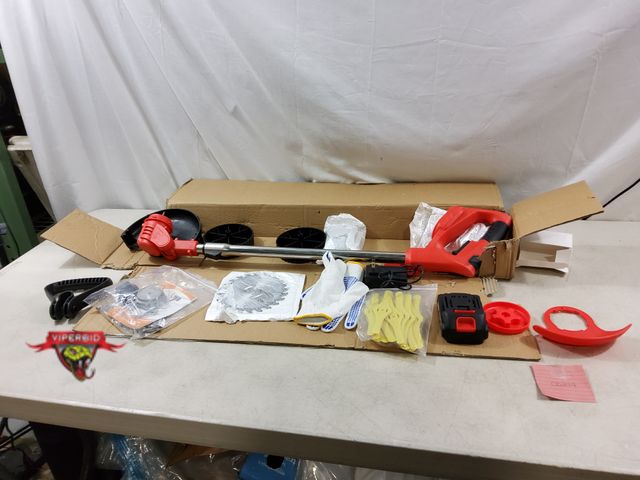 Lot 7-133165 - Battery powered weed wacker with (2) 21V Batteries and accessories.