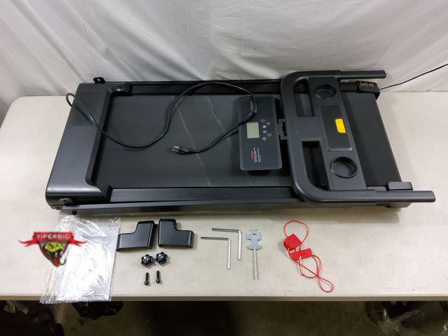 Lot 7-131817 - Compact, foldable walking pad / treadmill with safety key. Tested-Works