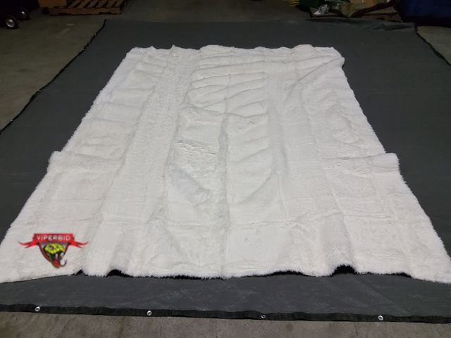 Lot 7-130285 - Quntue faux fur 9 ft. X 11 ft. Area rug.