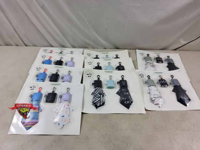 Lot 7-133219 - New! (9) Cleaning clothes 3 per pack. Includes hook &amp; empty 2ml spray bottle.