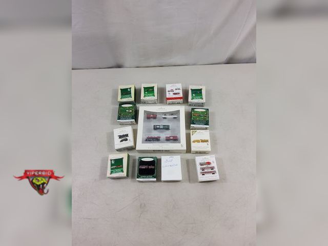 Lot 7-123441 - (13) Boxes of assorted Hallmark miniature train Christmas tree ornaments.