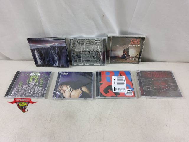 Lot 7-133503 - New - Cases damaged. (7) Assorted cd's. Most Cd's are sealed.