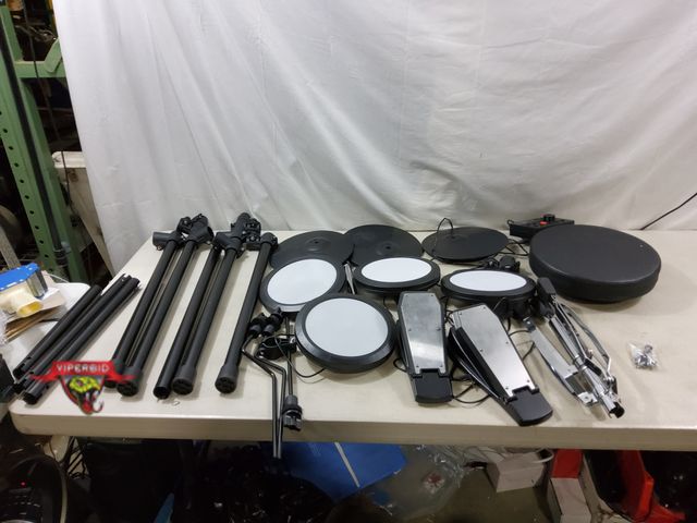 Lot 7-131759 - Donner beginner drum set. No instructions.