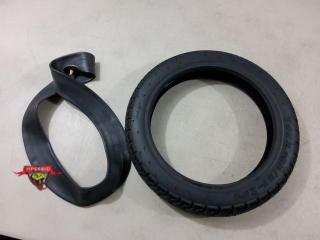 Lot 7-134331 - Tube and tire. 14 X 2.125 / 57-254