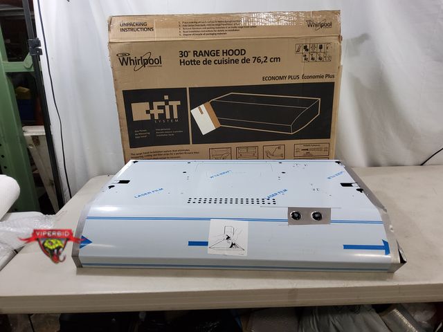 Lot 7-135011 - Damage to corner. Whirlpool 30" Range hood. Front RH side corner bent (see pic).