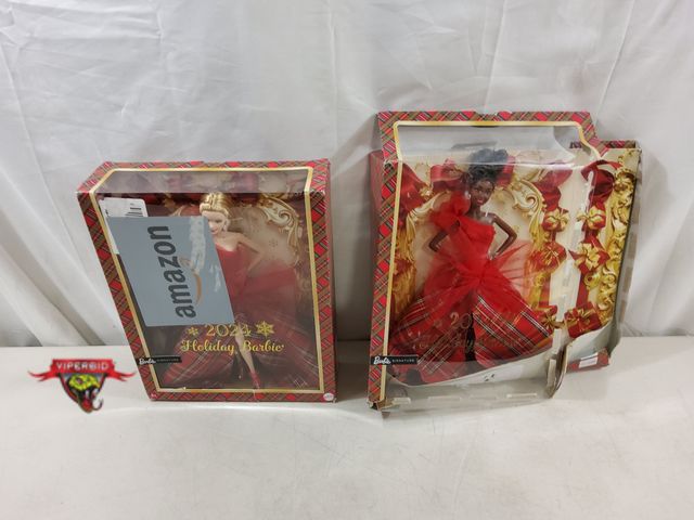 Lot 7-123527 - New - Damaged boxes. (2) 2024 Holiday Barbies.