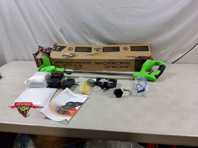 Lot 7-133070 - Cordless Weed Wacker. Light duty, Battery Included with Weed Wacker arms and Saw Blade. Tested and W...