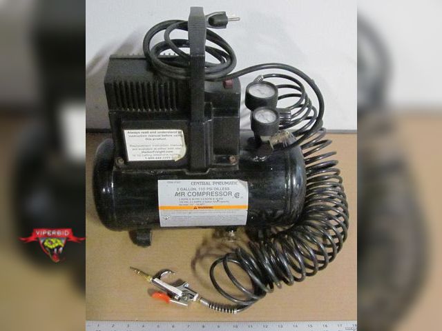 Lot 7-132770 - Small air compressor with 2 gallon tank, hose, and new lever action hose nozzle. The compressor is u...