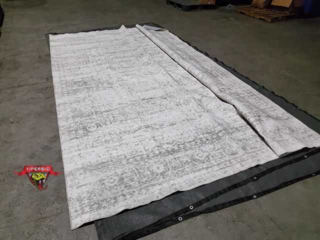 Lot 7-135800 - 10 ft. X 14 ft. Area rug.
