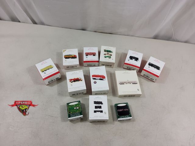Lot 7-123470 - (14) Assorted Hallmark Train Christmas tree ornaments