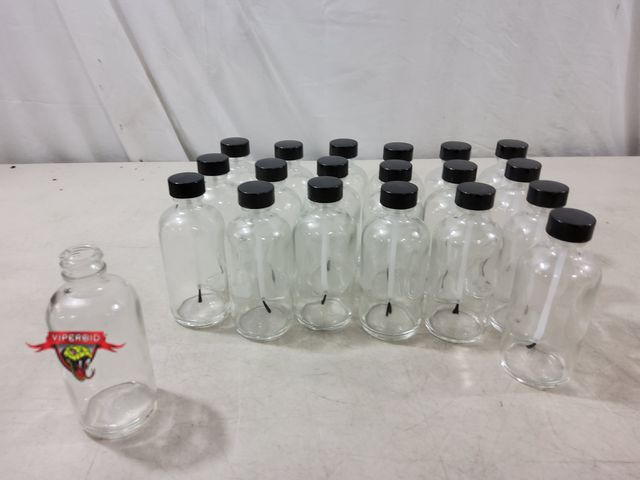 Lot 7-134681 - (19) 4-1/2"H Glass Jars with attached brush lids and (1) 4-1/2" H Glass jar with no lid.