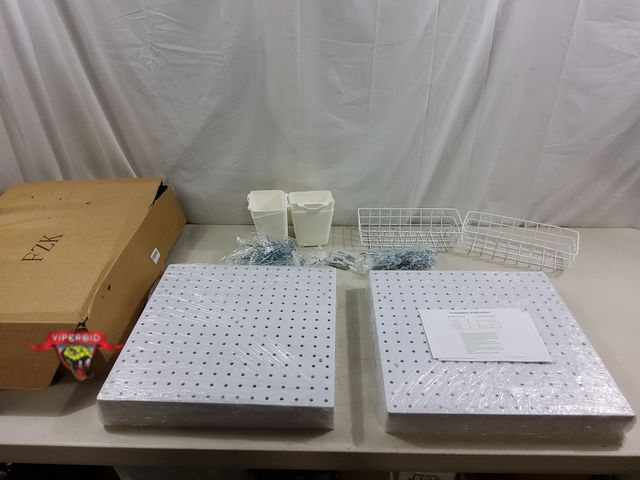 Lot 7-123442 - (8) FZK Plastic peg board 16" X 16" Pieces with accessories.