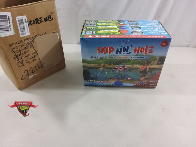 Lot 7-131045 - Looks new! Skip NN' Hole game. Skipping stones meets cornhole! They float!