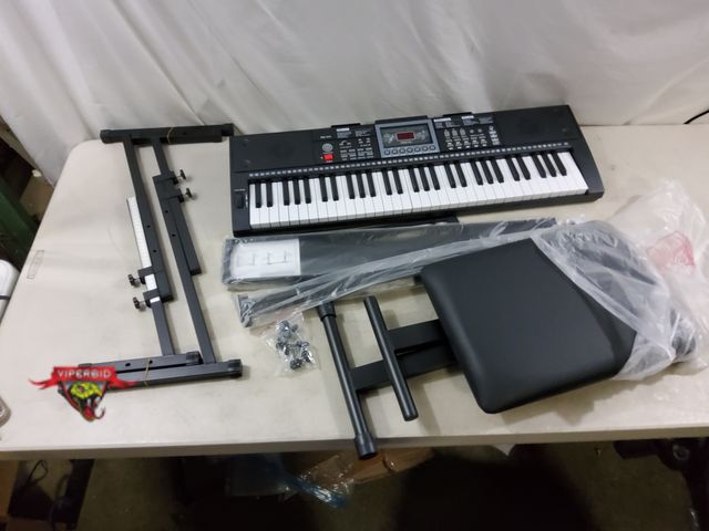 Lot 7-133257 - 61-key portable electronic keyboard designed for beginners and children with stand and bench. Model ...