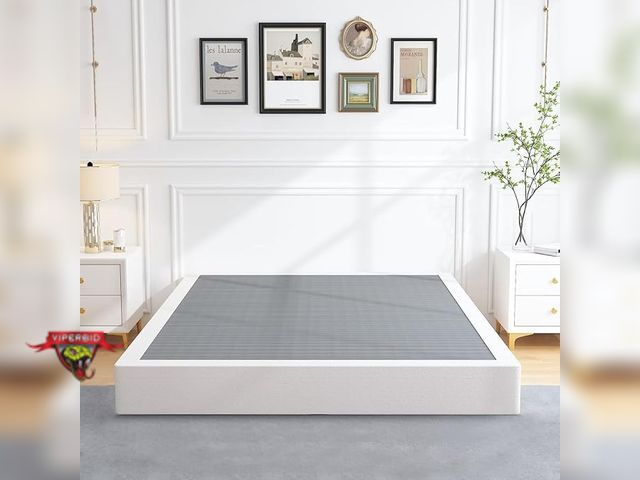 Lot 7-131396 - Looks new! King size box spring with cover.