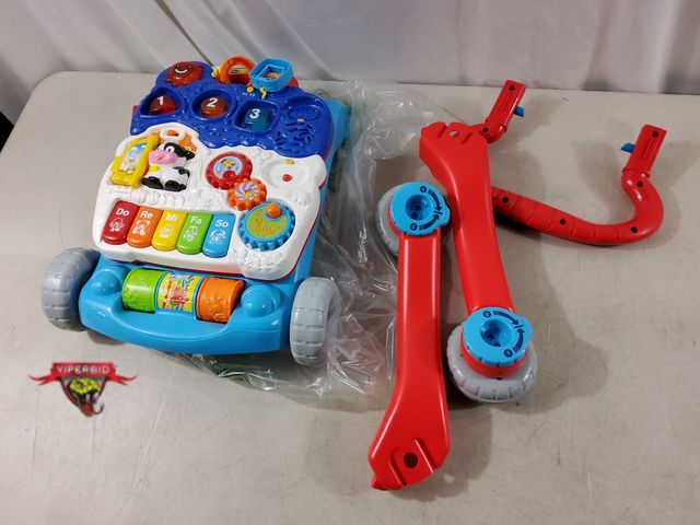 Lot 7-135637 - Vtech sit to stand walker.