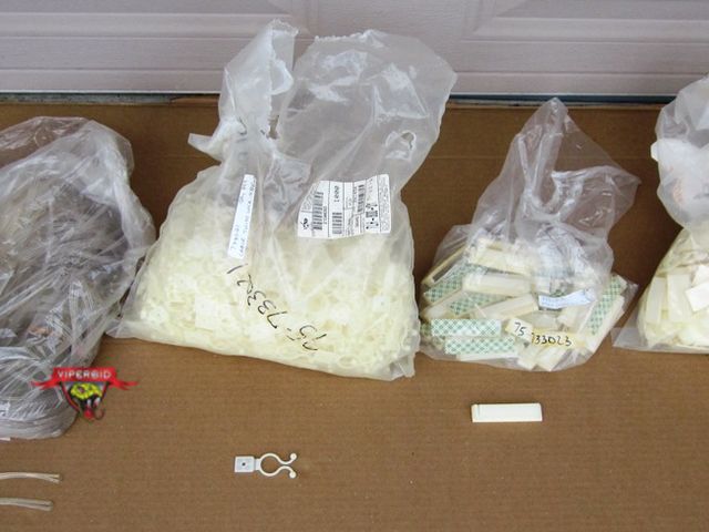 Lot 7-132772 - Three partial bulk bags of three types of nylon cable clips.  New old stock.