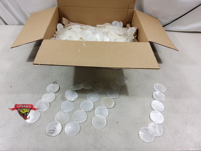 Lot 7-134387 - Lot of capiz shell garland strands. Lengths range from 7-1/4" to 11-1/4".
