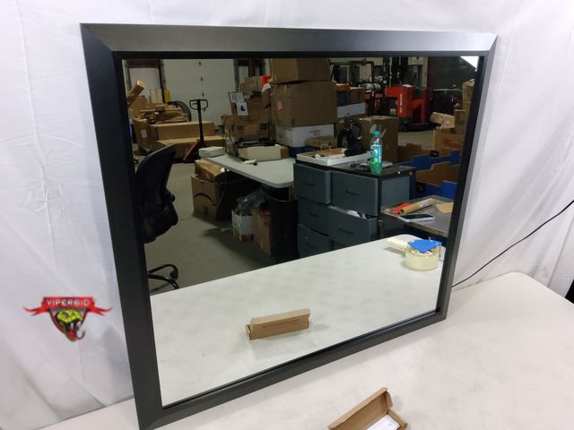 Lot 7-131302 - Briivue Black Metal Framed Wall Mirror. (31.5" x 35.5")