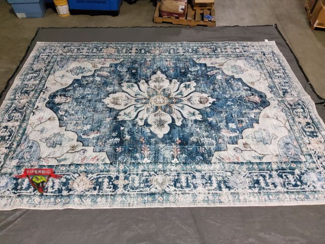 Lot 7-133390 - 10 ft. X 14 ft. Area rug.