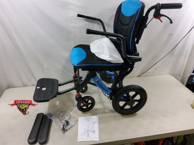 Lot 7-130456 - Retail value $242! Pro Traverse lightweight foldable transport chair with 12" Rear wheels.