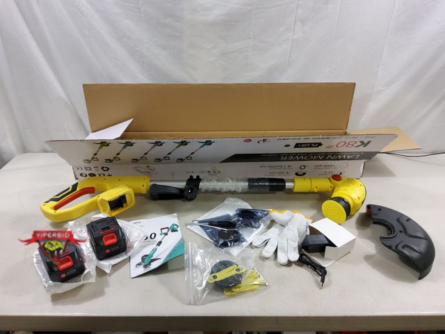 Lot 7-131347 - JWDJ cordless string trimmer with (2) Batteries and charger. Model K80 2-in-1 tool.  Powers on - spi...