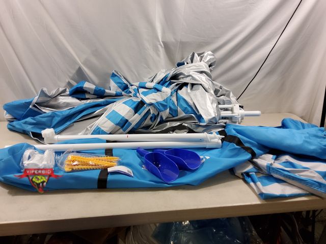 Lot 7-134417 - GoRich beach cabana. Model G029. Gently used.