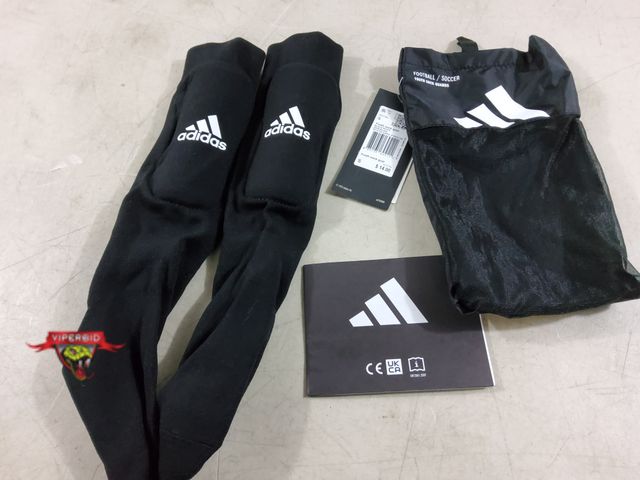 Lot 7-133469 - New! Adidas youth sock guards. Size: S.