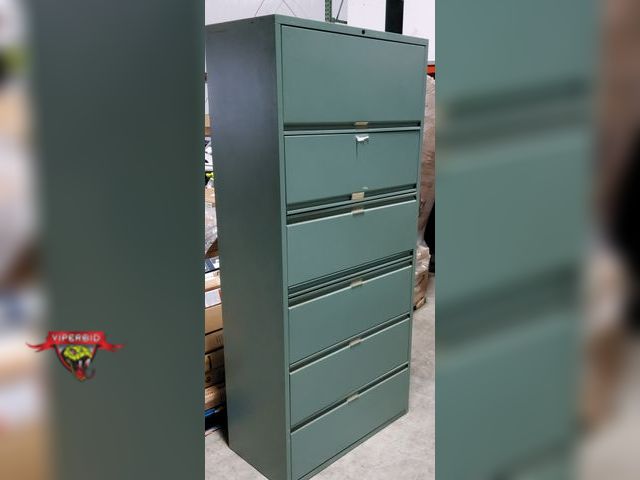 Lot 7-131412 - 4-Drawer, 2-Shelf Metal file cabinet. Lock has been drilled out. 79-1/2" H X 36" X 18-1/2".