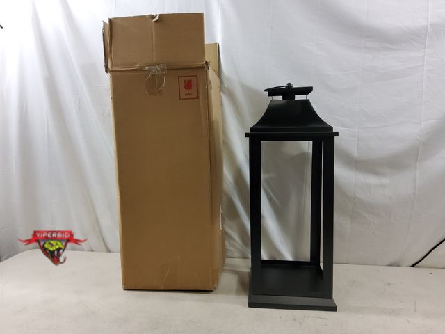Lot 7-133250 - Metal lantern candle holder. 8" X 22-1/2"H.